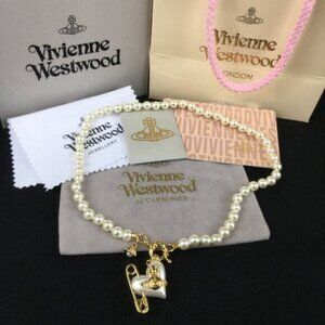 Vivienne Westwood Pear with hearts necklaces